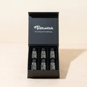The open Terplandia Magic Box with six terpene aroma bottles